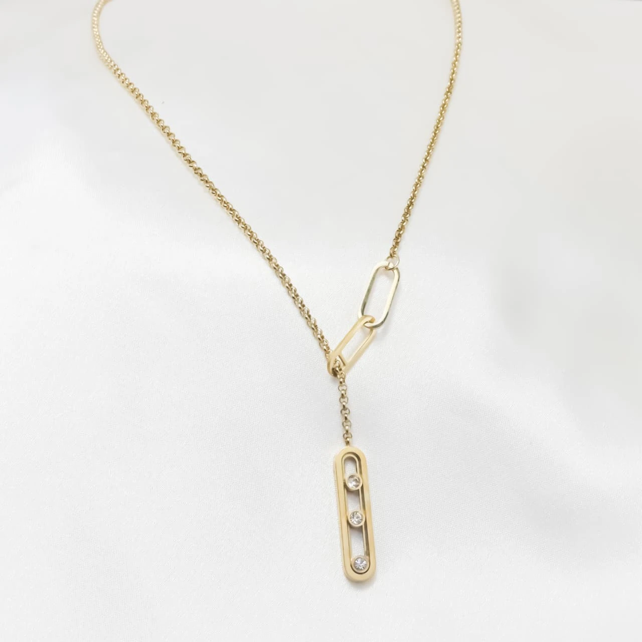 The Triple-Stone Kinetic Drop Necklace